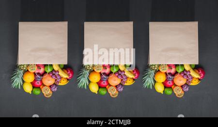 Concept drogheria shopping sacchetto di carta frutta , vendita, promozione. Prodotti ecologici freschi, prodotti salutari, vista dall'alto Foto Stock
