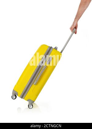 Mano con valigia isolata su bianco Foto Stock