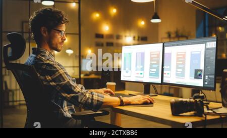 Ufficio creativo di tarda serata: Programmatore professionale lavora su un computer desktop, creando Phone App Design, utilizzando il software di editing. Moderno ed elegante Foto Stock