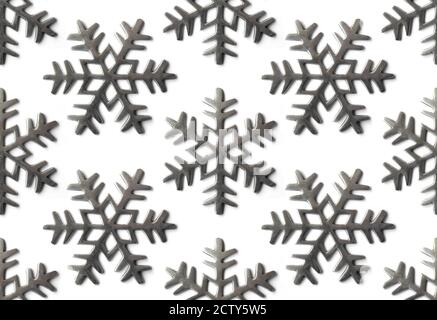 Modello di fiocco di neve in argento. Decorazioni o ornamenti dell'albero di Natale. Concetto di stagione di Natale. Isolato su bianco. Ripetizione in x e y. Foto Stock