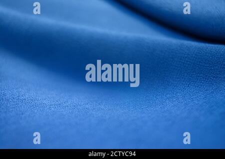 Tessuto blu come sfondo tessile astratto Foto Stock