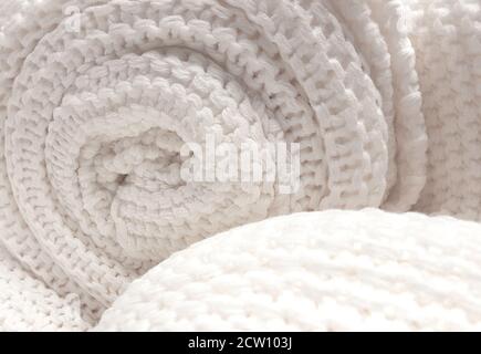 Naturale tessuto tessuto di lana tessuto tessuto di cotone a maglia sfondo. Messa a fuoco selettiva Foto Stock