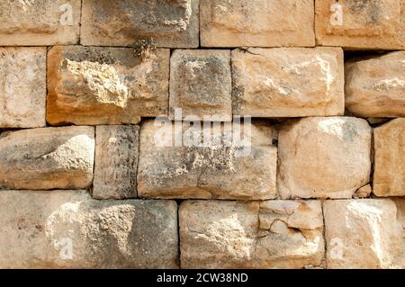 Pietre grandi pietra arenaria antica muratura asciutta closeup muro come pietra sfondo Foto Stock