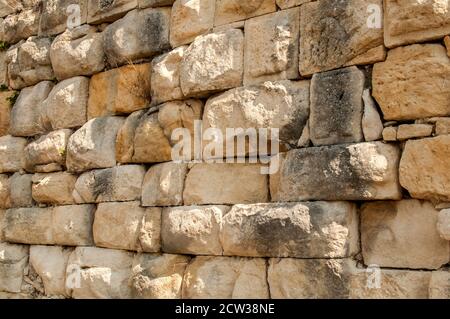 Pietre grandi pietra arenaria antica muratura asciutta closeup muro come pietra sfondo Foto Stock