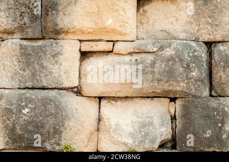 Pietre grandi pietra arenaria antica muratura asciutta closeup muro come pietra sfondo Foto Stock