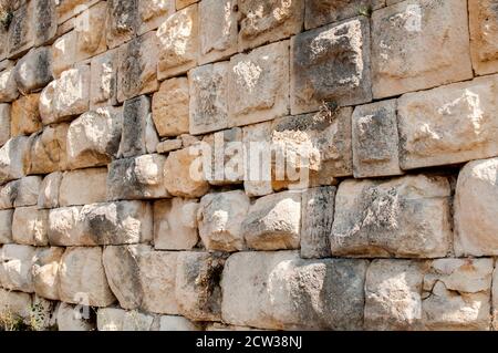 Pietre grandi pietra arenaria antica muratura asciutta closeup muro come pietra sfondo Foto Stock