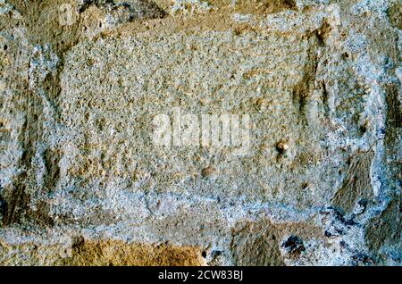 Struttura di un muro di pietra. Vecchio castello pietra sfondo struttura muro. Muro di pietra come sfondo o struttura. Parte di un muro di pietra per sfondo o testo Foto Stock