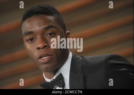 WEST HOLLYWOOD, CA - MARZO 02: Chadwick Boseman assiste il 2014 Vanity Fair Oscar Party hosted by Graydon Carter il 2 marzo 2014 in West Hollywood, California. Persone: Chadwick Boseman Foto Stock