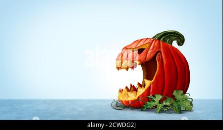 Zucca di Halloween con sfondo copy space come un personaggio spaventoso jack o lanterna in una vista laterale con una bocca aperta come simbolo per la caduta e l'autunno. Foto Stock