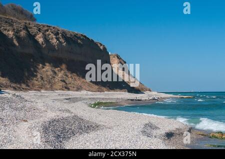 Effetti del mare erosione costiera con suolo argilloso Foto Stock