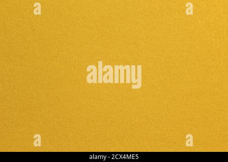 Carta metallizzata oro brillante primo piano, trama glitter astratta colore decorazione sfondo Foto Stock