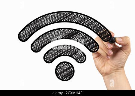 Segnale Wi-Fi. Doodle su una lavagna bianca, scritta con un pennarello nero in una mano. Tracciare uno schizzo su una lavagna bianca Foto Stock