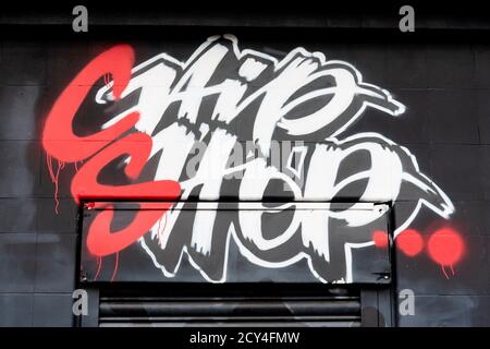 Una vista di un chip Shop logo.chip Shop BXTN, è un negozio di chip Hip Hop all'angolo di ColdhHarbour Lane e Atlantic Road a Brixton, Londra, che serve cibo, musica e ospita eventi dal vivo. Foto Stock