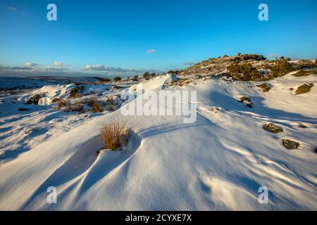 Cheesewring; nella neve; Cornovaglia; Regno Unito Foto Stock