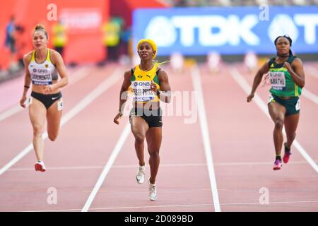 Shelly-Ann Fraser-Pryce (MARMELLATA), Gina Lückenkemper (GER), Tebogo Mamathu (RSA). 100 metri, rotonda 1. Campionato mondiale di atletica, Doha 2019 Foto Stock