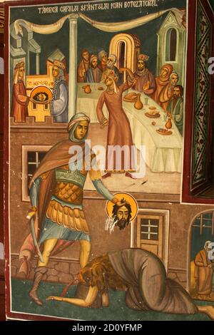 Monastero di Caldarusani, Contea di Ilfov, Romania. Affresco raffigurante la decapitazione di Giovanni Battista. Foto Stock