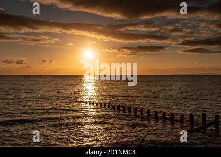 Tramonto a Barmouth sulla costa del Galles Foto Stock