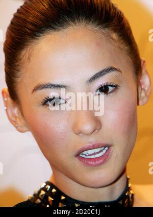 Hong Kong actress Cecilia Cheung attends a photo exhibition by Zing, a famous make-up artist, in Hong Kong September 15, 2005. REUTERS/Paul Yeung  PY/AT
