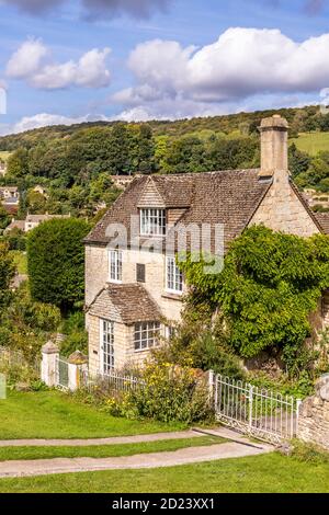 Un cottage in pietra nel villaggio di Cotswold di Sheepscombe, Gloucestershire Regno Unito Foto Stock