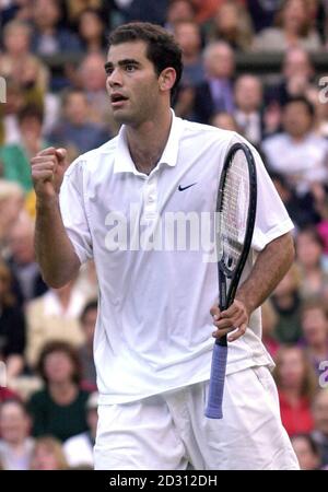 NESSUN USO COMMERCIALE: NESSUN USO COMMERCIALE: American Pete Sampras celebra la vittoria del secondo set della finale maschile di Singles contro Pat Rafter a Wimbledon. Foto Stock