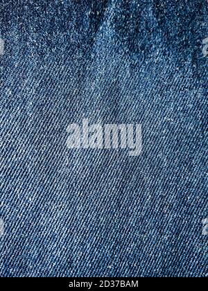 fondo texture jeans blu o fondo texture jeans nero. sfondo texture scuro o tessuto. Foto Stock