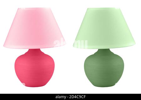 lampada da tavolo isolata su sfondo bianco. Set di due lampade di colore verde e rosa Foto Stock