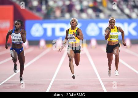 Shelly-Ann Fraser-Pryce (MARMELLATA), Dina Asher-Smith (GBR), Elaine Thompson (MARMELLATA). 100 metri finali. IAAF World Athletics Championships, Doha 2019 Foto Stock