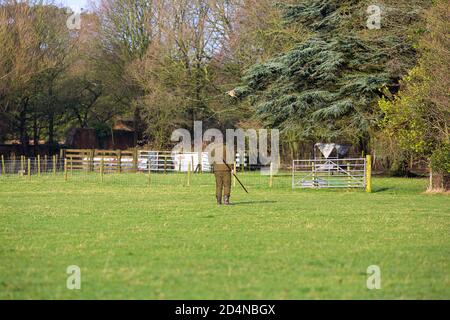 I bateri al lavoro su un tiro di gioco in Lancashire, Inghilterra Foto Stock