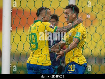 9 ottobre 2020; Arena Corinthians, Sao Paulo, Brasile; Coppa del mondo FIFA Qatar 2022 qualificazioni; Brasile contro Bolivia; Roberto Firmino del Brasile celebra il suo obiettivo con Everton nel 30 minuti 2-0 Foto Stock