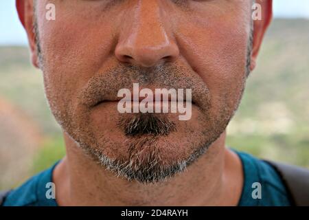 Primo piano della parte inferiore della faccia di un uomo Foto Stock