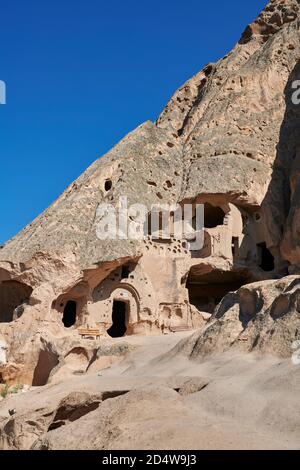 Vista esterna del monastero di roccia paleocristiana nella roccia vulcanica. VIII-IX sec. d.C. Cattedrale di Selime in Cappadocia, Ilhara Vallet, Turchia Foto Stock