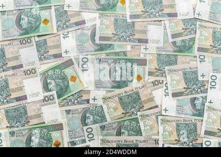 Sfondo della banconota da 100 zloty polacca, sfondo per la finanza e l'economia. Foto Stock