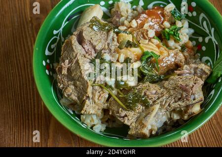 Tfina Pkaila - stufato di manzo, piatto ebraico tunisino Foto Stock