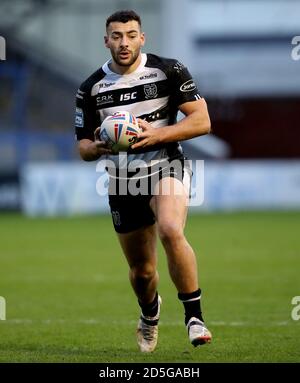 Jake Connor della Hull FC corre con la palla durante la partita di Betfred Super League allo stadio Halliwell Jones di Warrington. Foto Stock