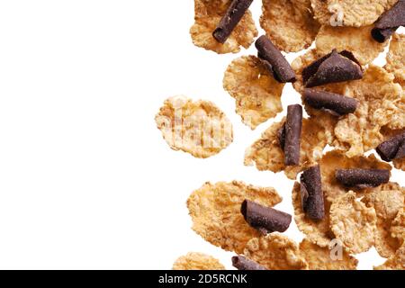 Cereali biologici fatti in casa con cioccolato. Texture granola di farina d'avena o muesli come sfondo. Concetto di cibo. Cibo sano e sano. Vista dall'alto. Foto Stock