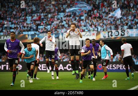 I giocatori di Manchester United si stanno riscaldando prima del gioco Foto Stock