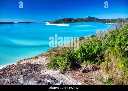 Vista aerea delle fantastiche isole Whitsunday. Whitehaven Beach in una giornata di sole. Foto Stock