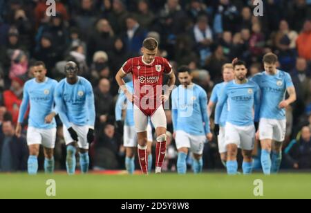 Il Jamie Paterson di Bristol City appare deopposto dopo aver perso a Manchester Città 2-1 Foto Stock
