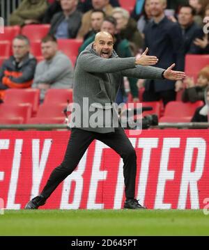 L'allenatore Pep Guardiola di Manchester City reagisce durante il gioco Foto Stock