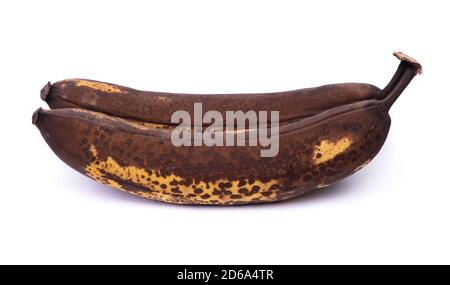 Due vecchie banane supermature isolate su sfondo bianco Foto Stock