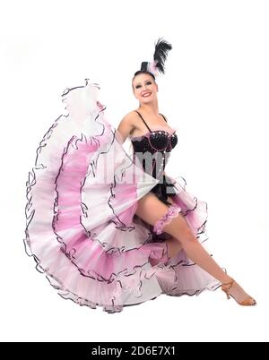 Allegro ballerino in posa indossando gonna, corset e cappello Foto Stock