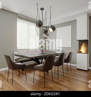 Sala da pranzo dal design italiano moderno con piccolo caminetto e cornice vuota, mock-up, rendering 3d, illustrazione 3d Foto Stock