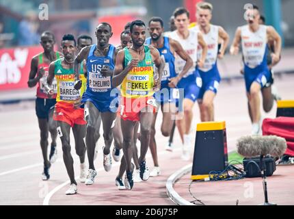 Telahun Haile Bekele (Etiopia), Paul Chelimo (USA), Selemon Barega (Etiopia). 5000 metri uomini finale. IAAF World Athletics Championships, Doha 2019 Foto Stock