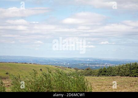 Nuvola che attraversa la pianura di Cheshire vista da Moorside Lane Lyme Handley vicino a Poynton Cheshire Inghilterra Foto Stock