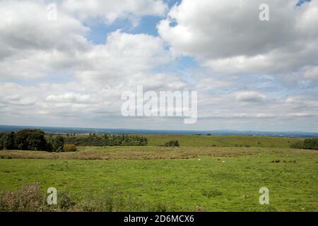 Nuvola che attraversa la pianura di Cheshire vista da Moorside Lane Lyme Handley vicino a Poynton Cheshire Inghilterra Foto Stock