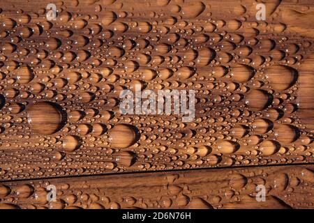 Esempio di superficie in legno idrorepellente Foto Stock