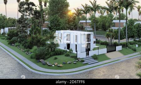 Dall'alto della facciata di un cottage contemporaneo con pareti bianche circondate da piante tropicali verdi che crescono nel cortile Foto Stock