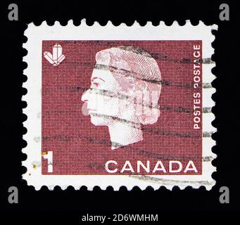 MOSCA, RUSSIA - 13 MAGGIO 2018: Un francobollo stampato in Canada mostra la regina Elisabetta II, cristalli, serie Definitives, circa 1963 Foto Stock