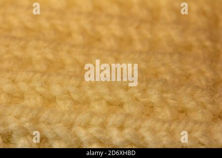 Full frame macro astratto arte sfondo di bianco cremoso irlandese sciarpa di lana e tessitura a guanto Foto Stock