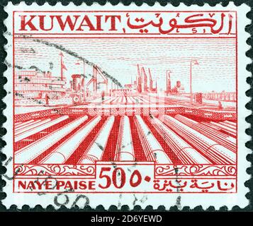 KUWAIT - CIRCA 1958: Un francobollo stampato in Kuwait mostra condotte, circa 1958. Foto Stock